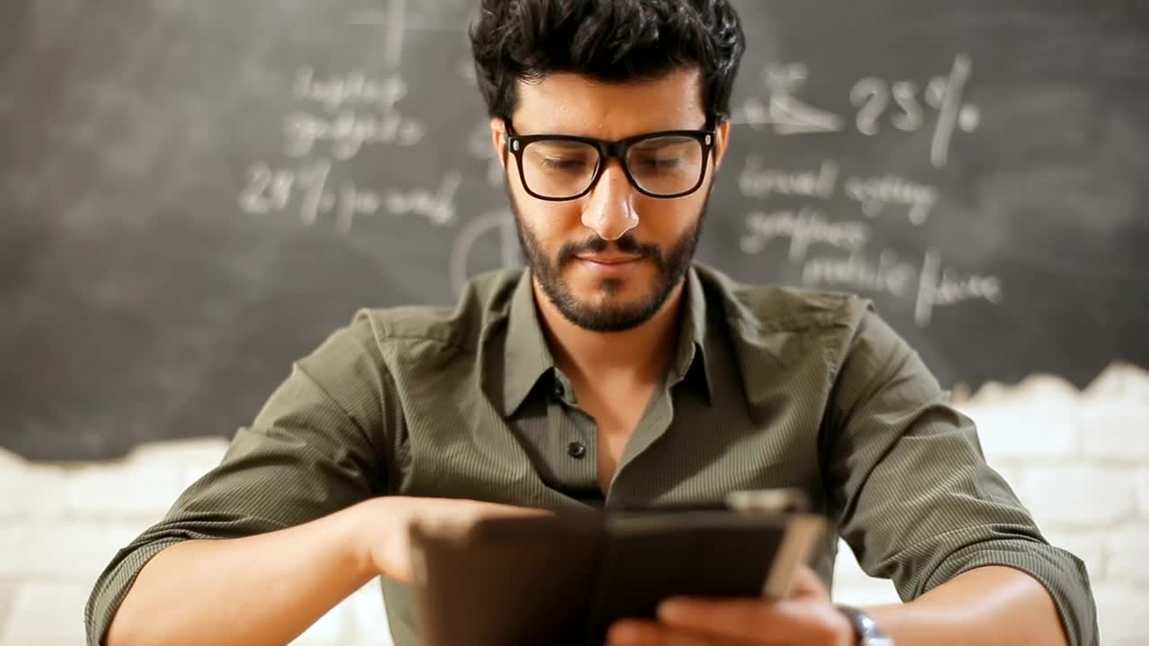   Stock Footage Urban Man Smiling With Tablet In Classroom Live Wallpaper