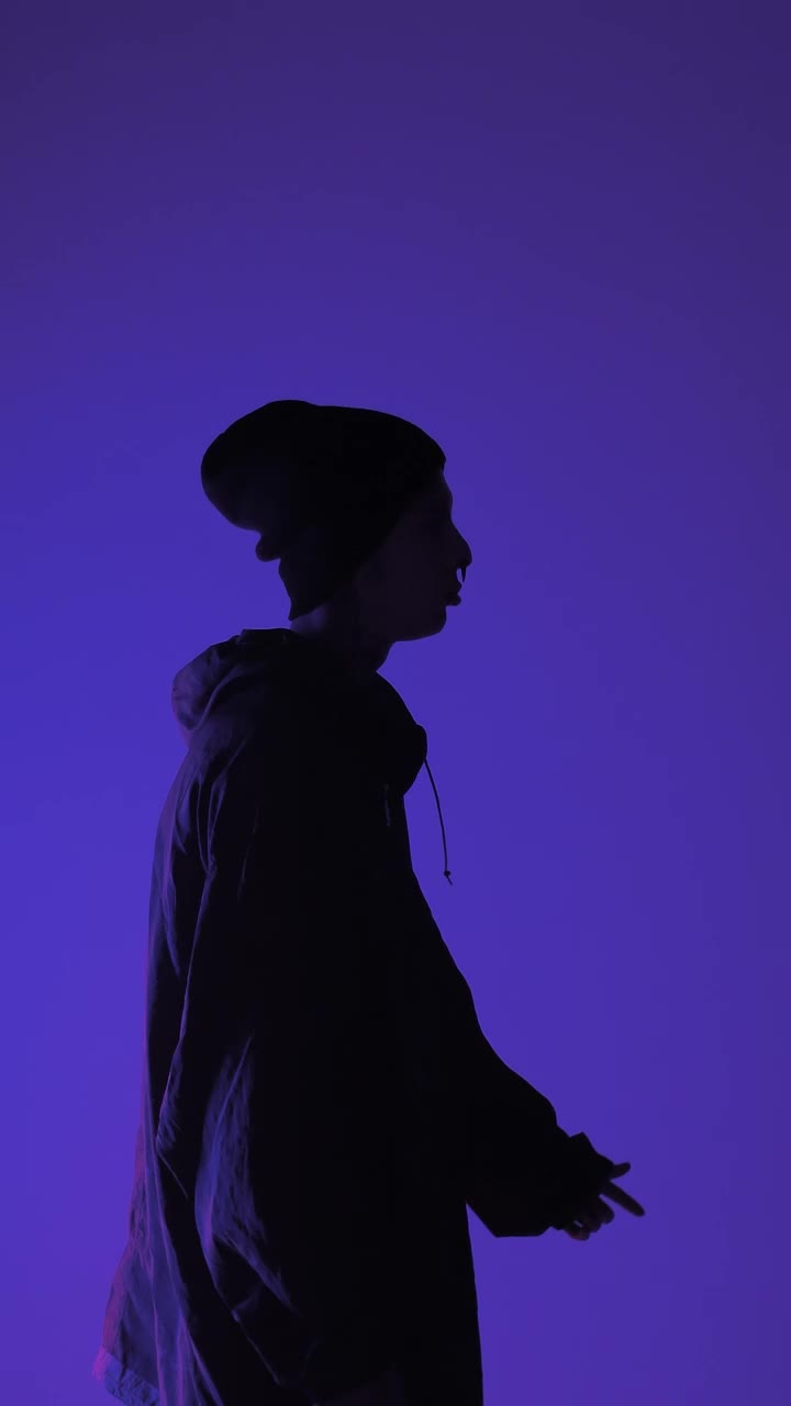   Stock Footage Urban Man In A Multicolor Light Room Live Wallpaper