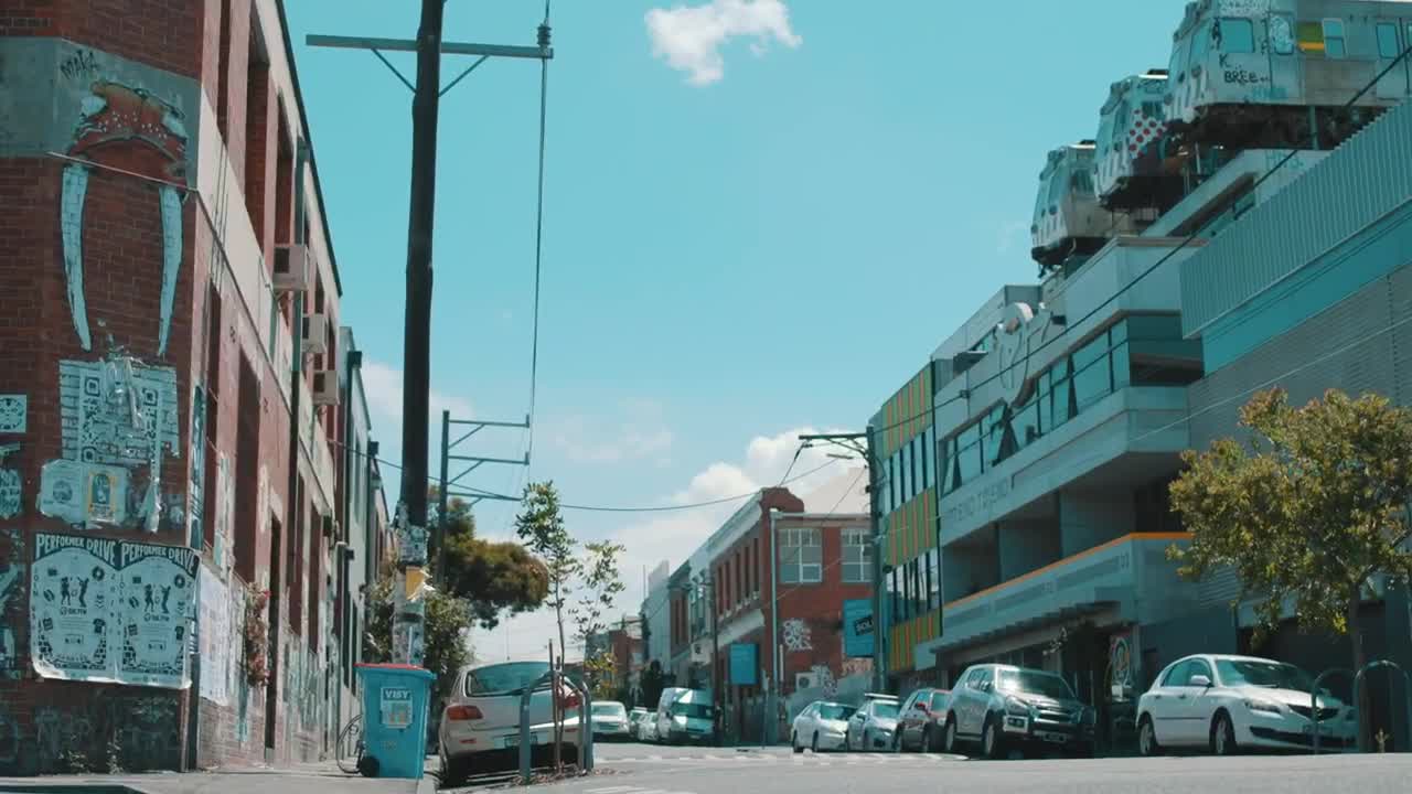   Stock Footage Urban Hipster Riding In A City Street Live Wallpaper