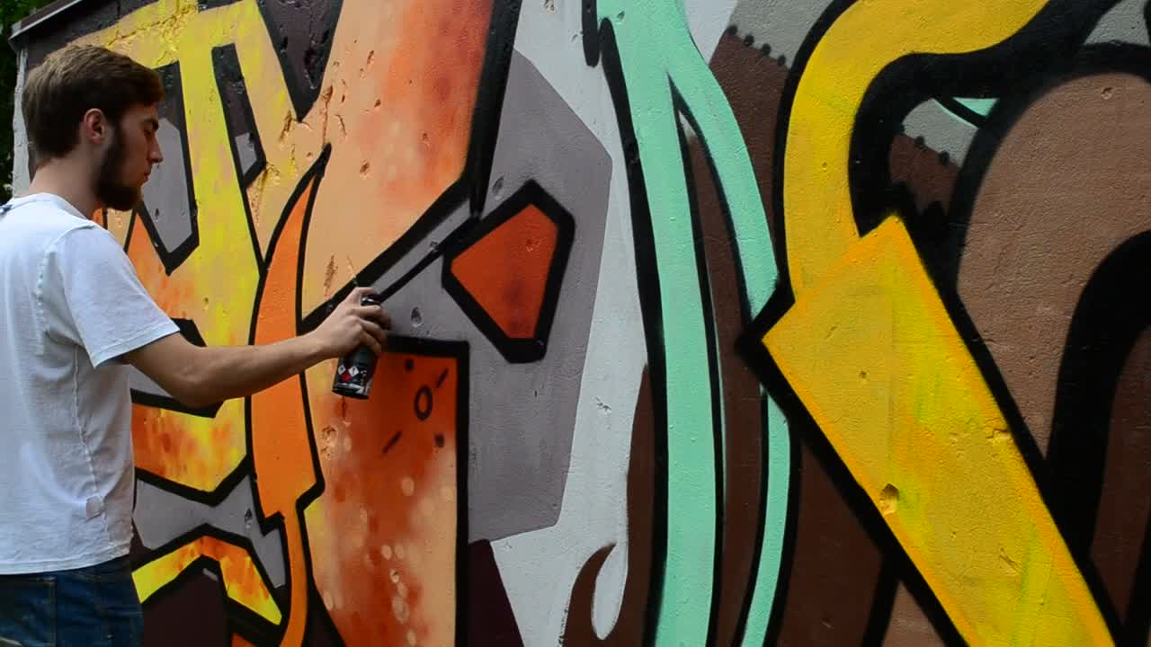   Stock Footage Urban Artist Spraying A Mural Live Wallpaper