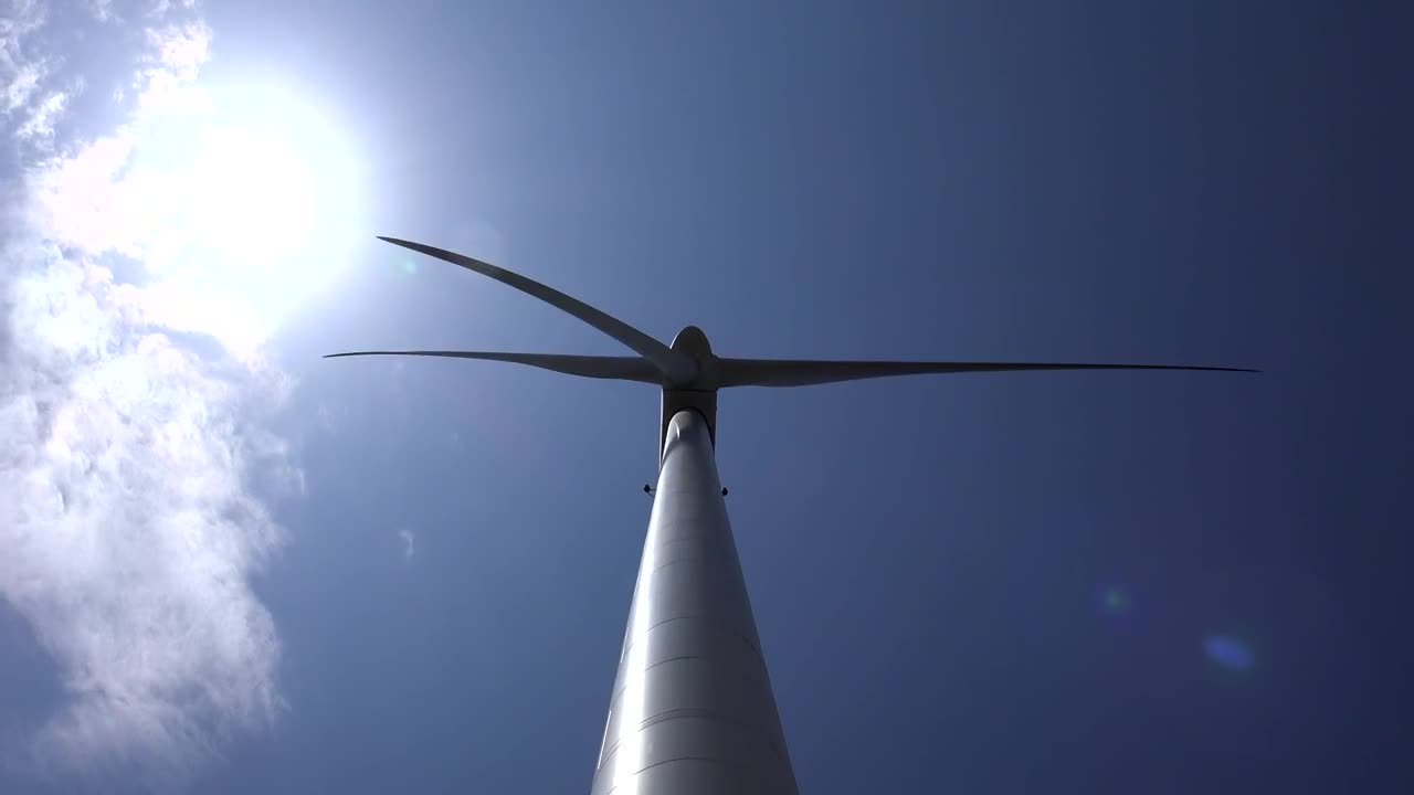   Stock Footage Upward View Of A Wind Turbine With The Sky In Live Wallpaper