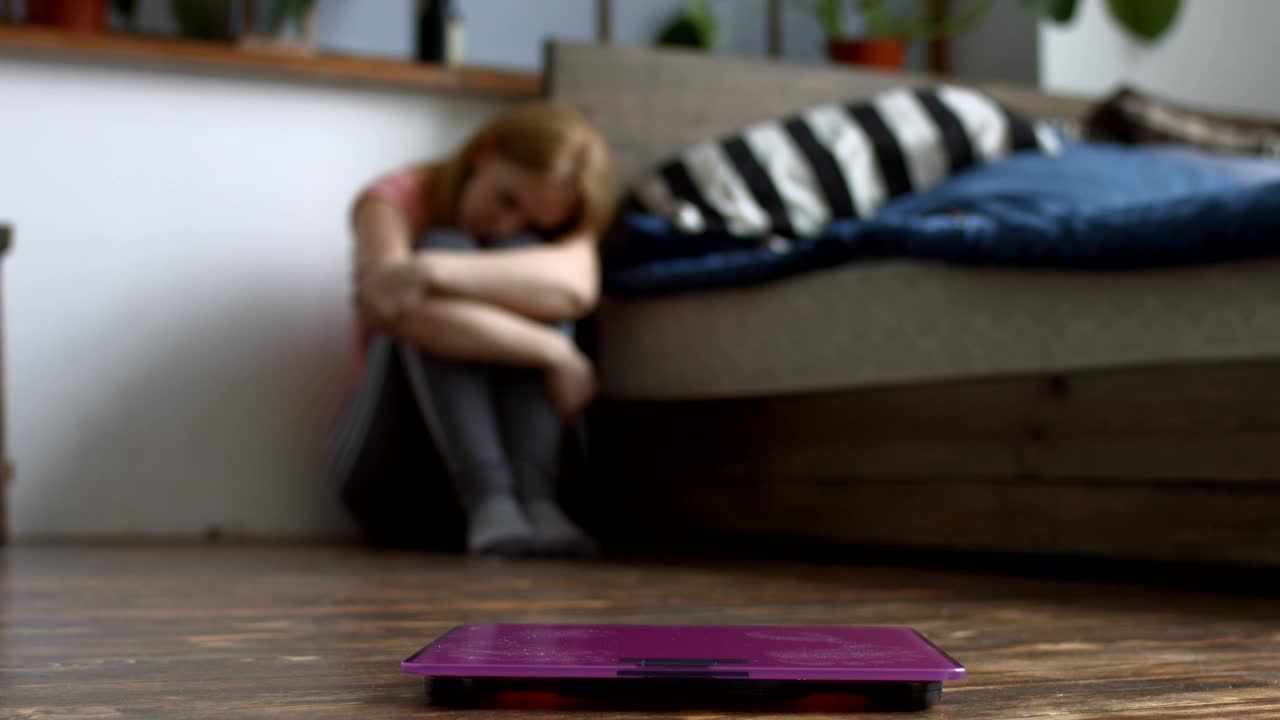   Stock Footage Upset Woman Sitting On The Floor Live Wallpaper