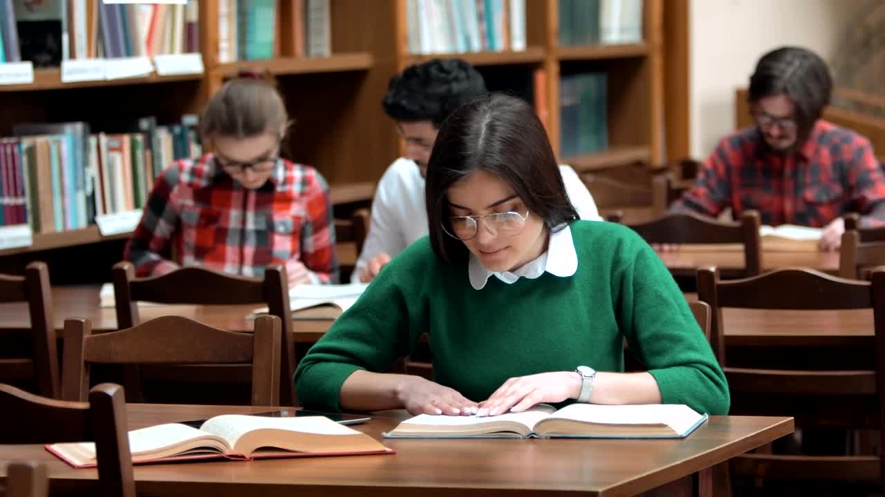   Stock Footage University Students Study Quietly In Library Live Wallpaper