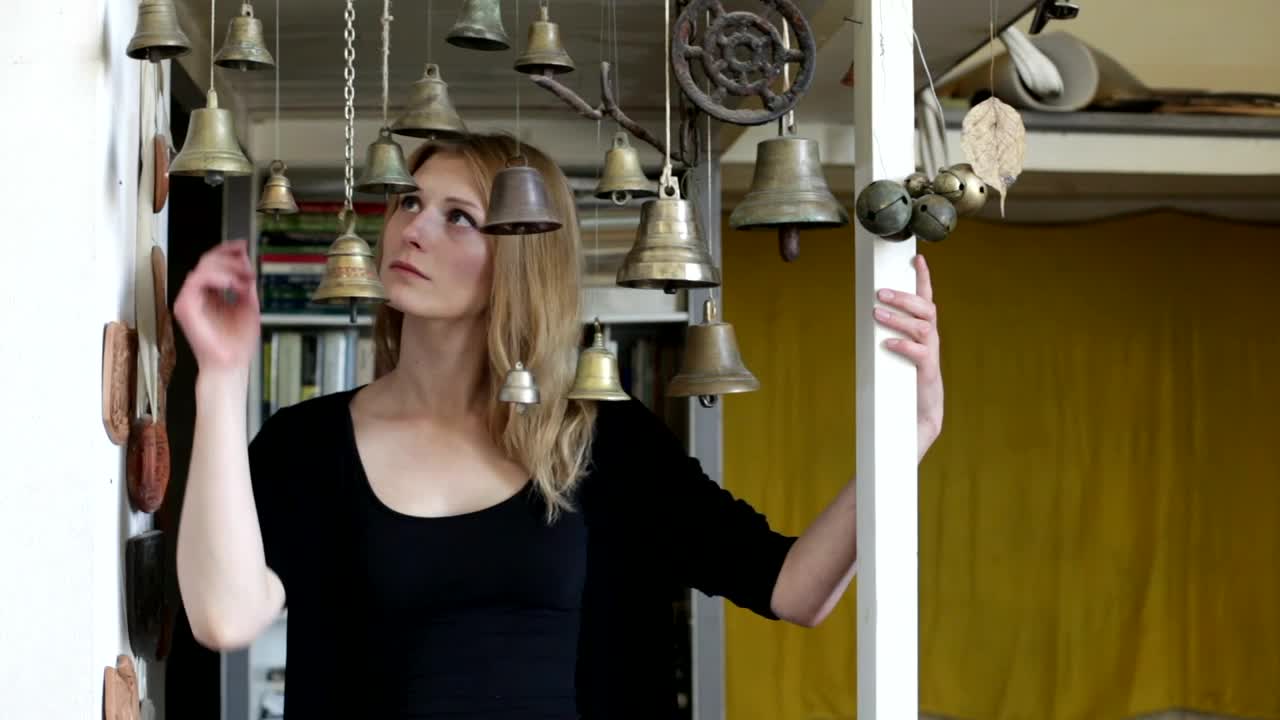   Stock Footage Unhappy Woman Playing With Bells Live Wallpaper