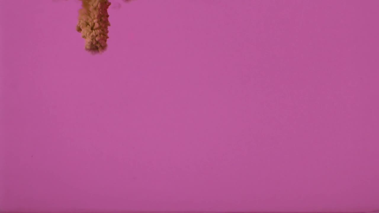  Stock Footage Underwater Ink Shot On Pink Background Live Wallpaper