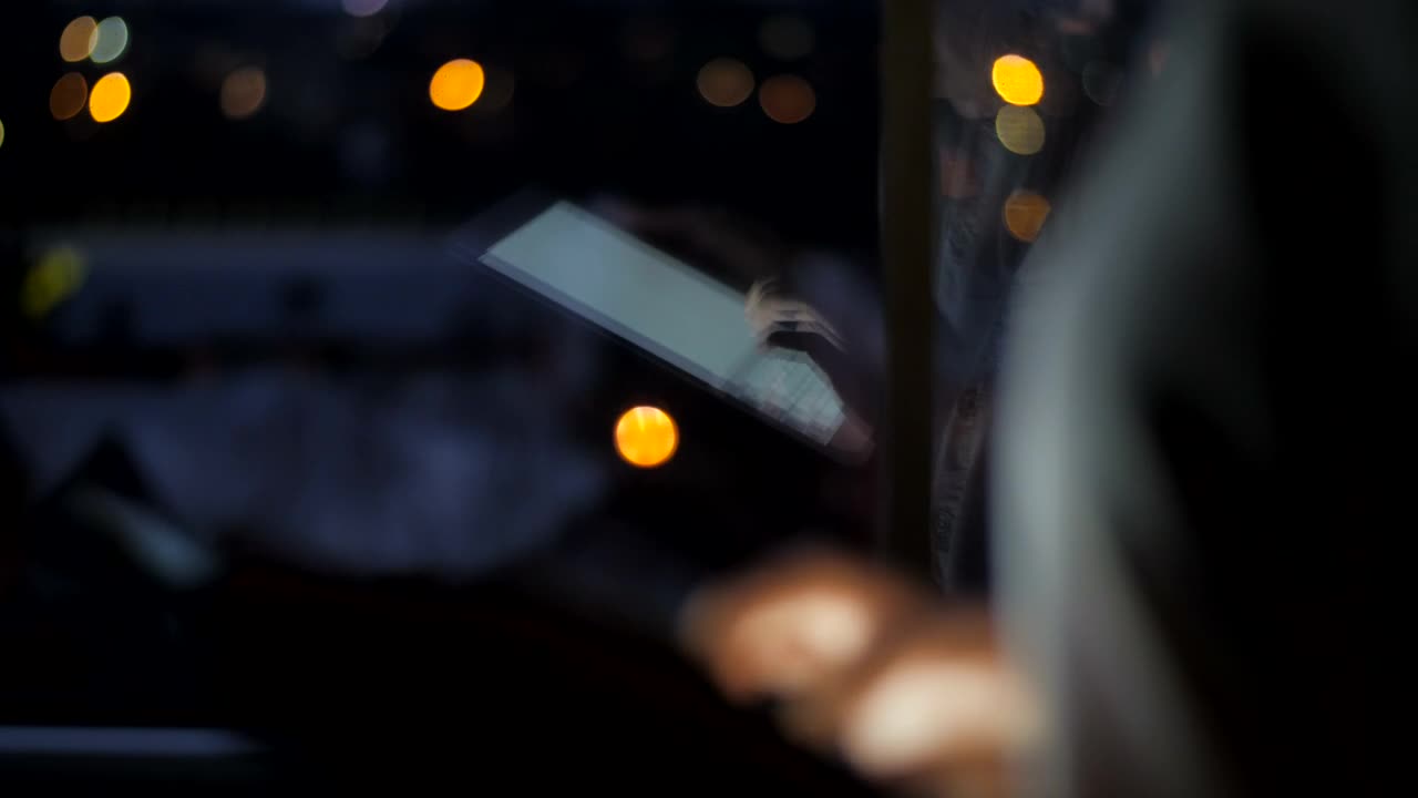   Stock Footage Typing On A Tablet By The Window Live Wallpaper
