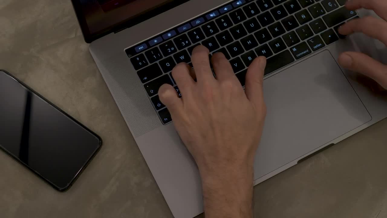   Stock Footage Typing On A Laptop Live Wallpaper