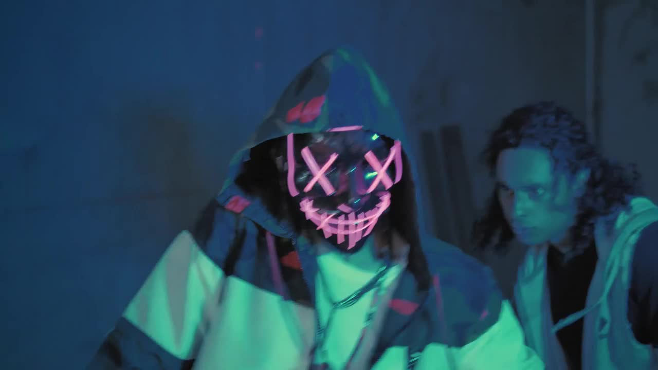   Stock Footage Two Young People Dancing Illuminated In Blue Live Wallpaper