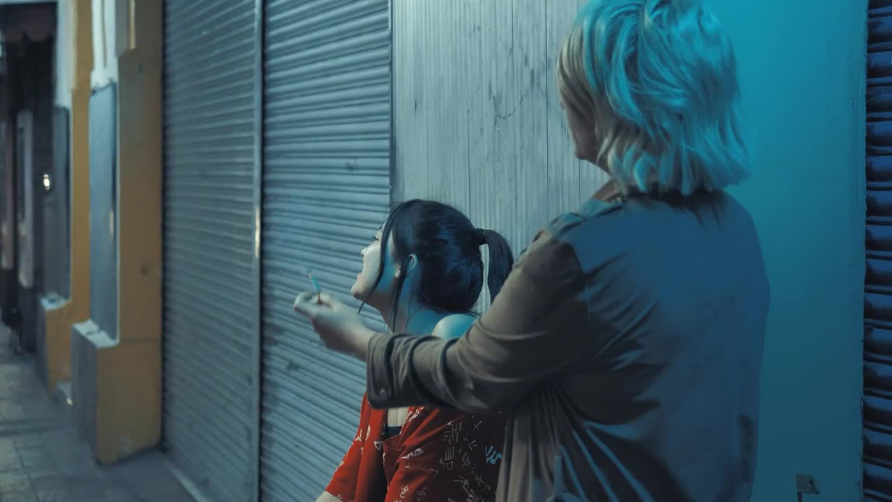   Stock Footage Two Women Sharing A Cigarette Live Wallpaper
