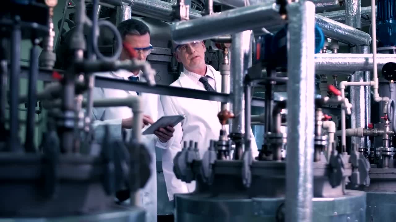   Stock Footage Two Scientist Checking Lab Instruments Live Wallpaper