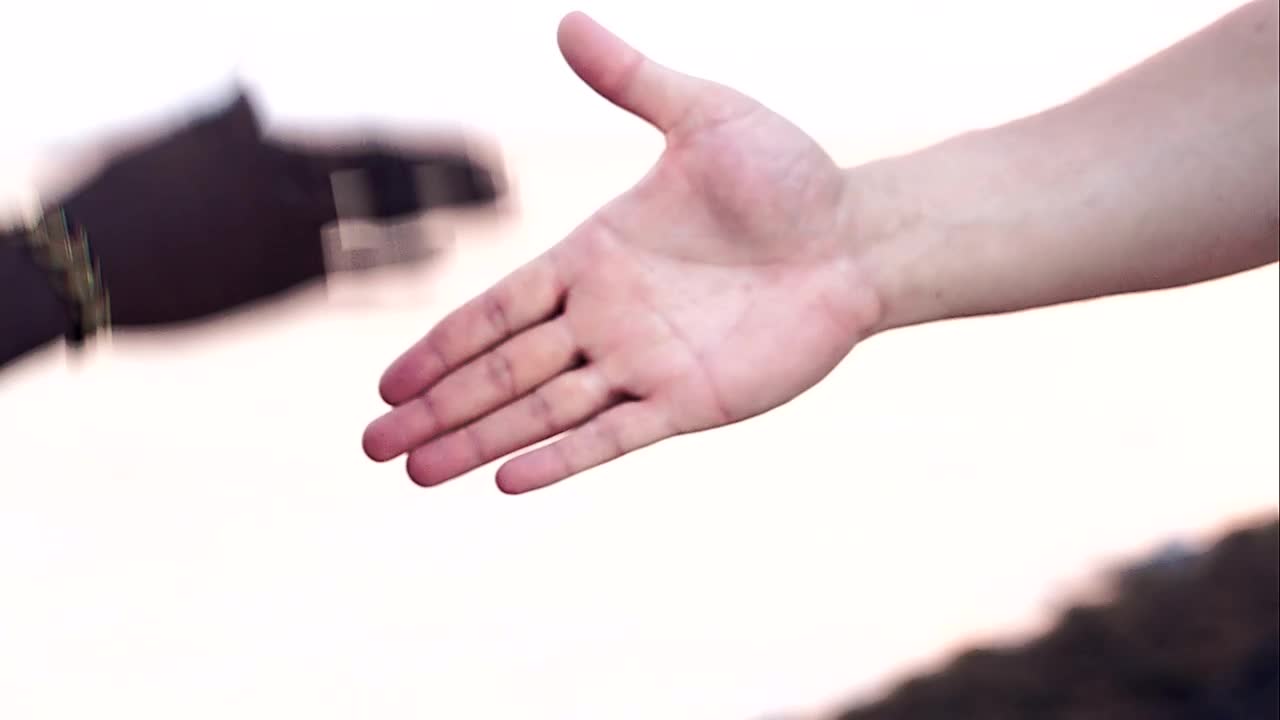   Stock Footage Two People Shake Hands Live Wallpaper
