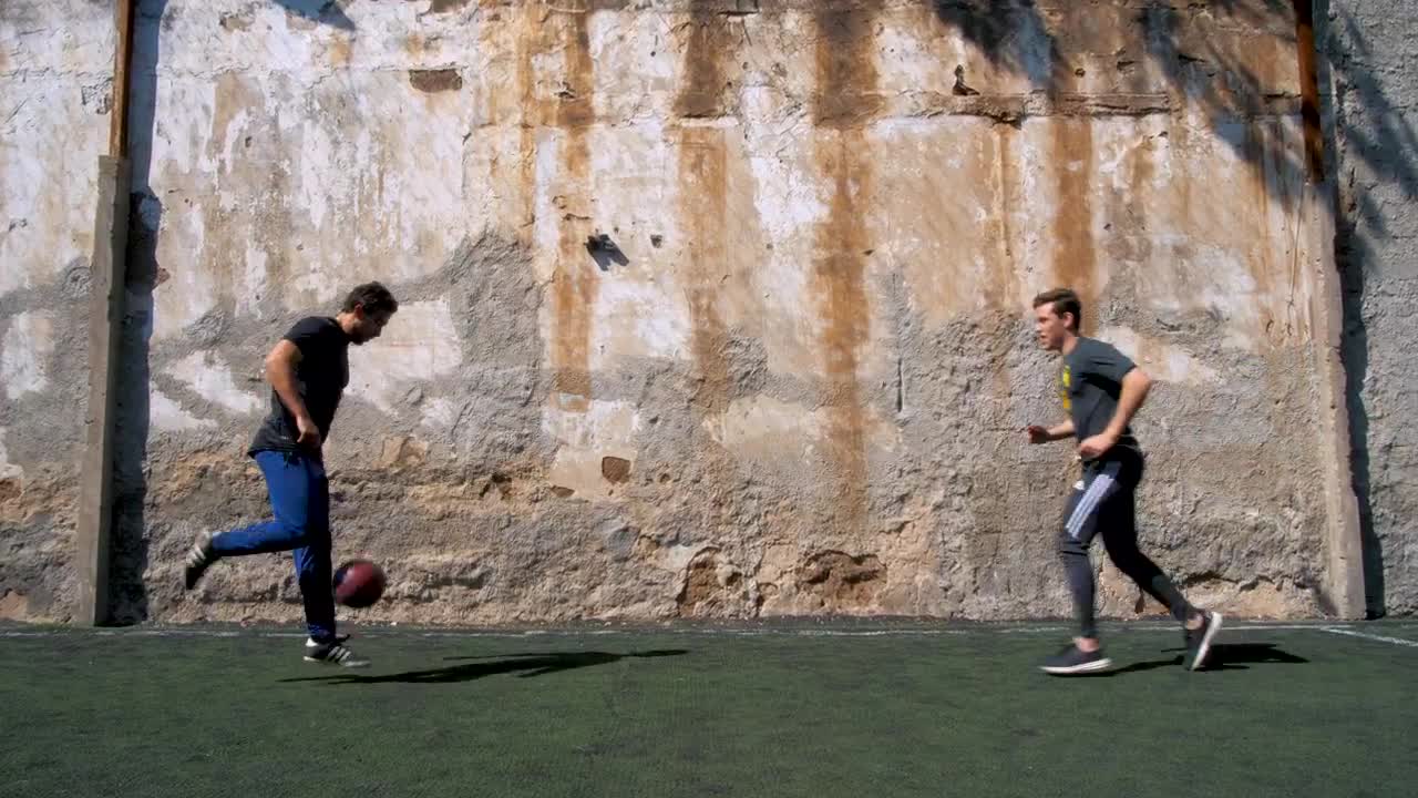   Stock Footage Two Men Playing With A Soccer Ball Live Wallpaper