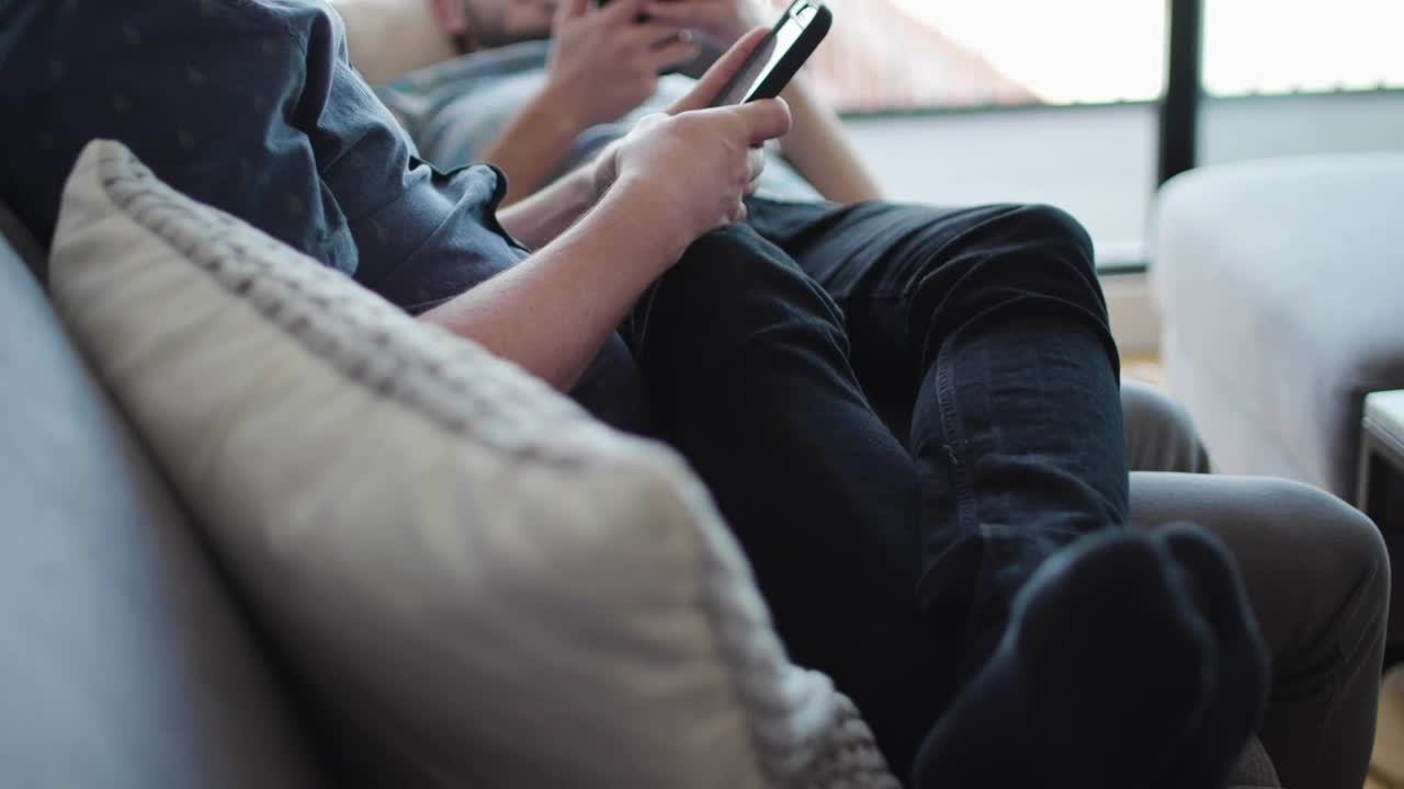   Stock Footage Two Men On A Couch Live Wallpaper