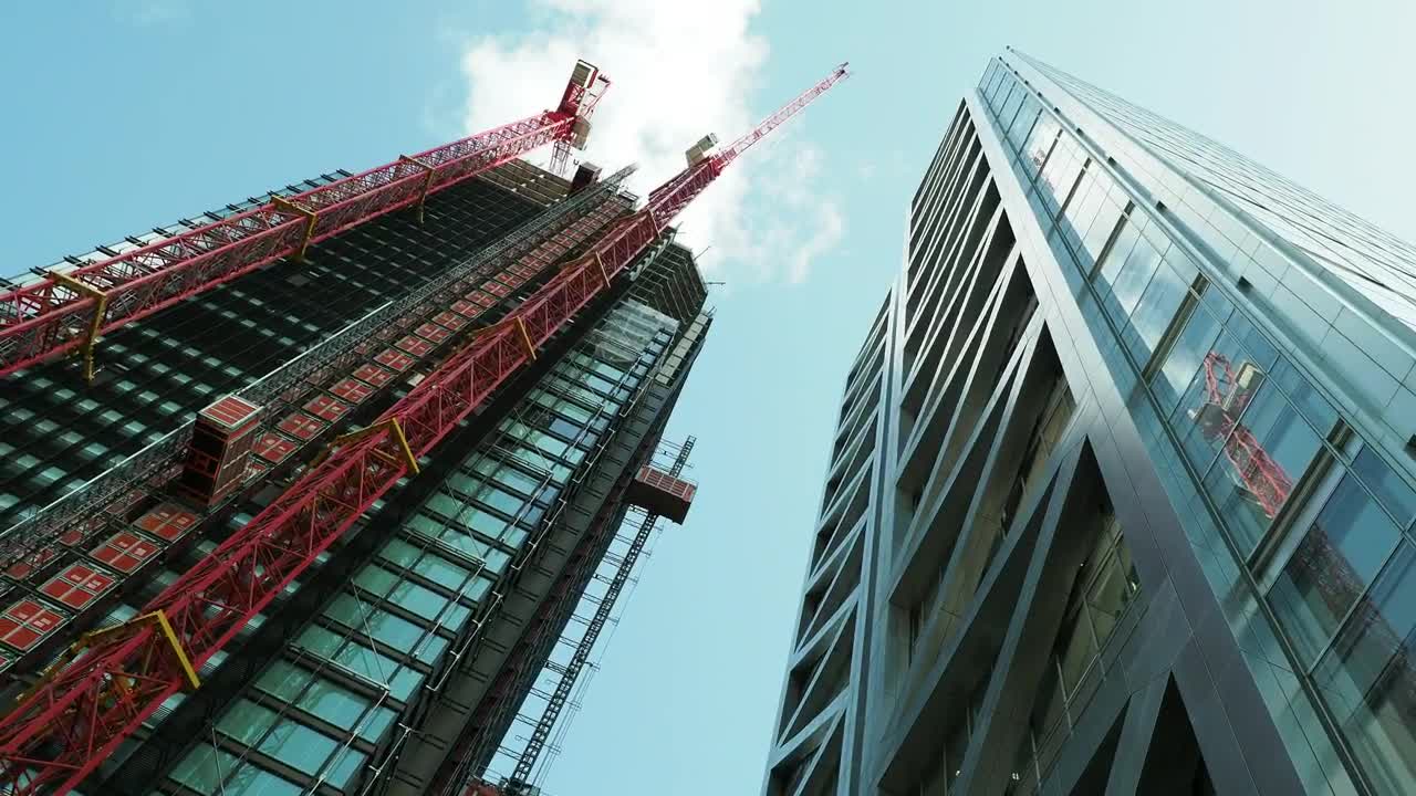   Stock Footage Two Large Buildings Seen From Below Live Wallpaper