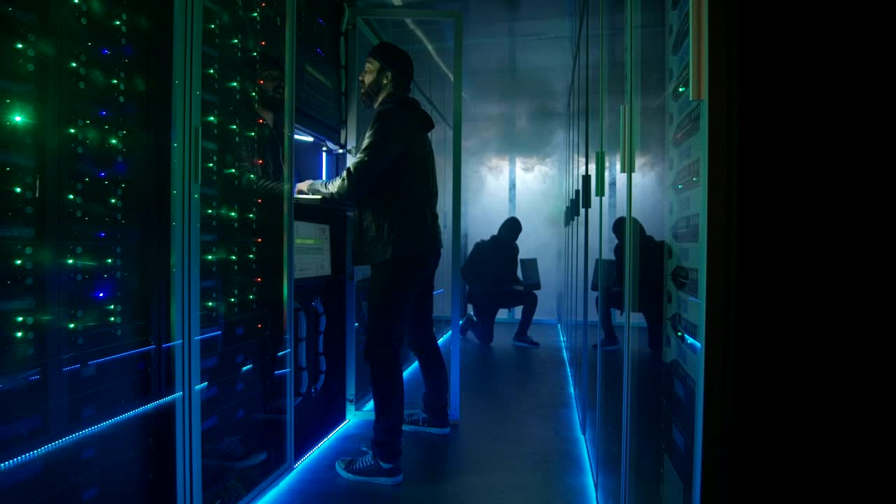   Stock Footage Two Hackers Escaping From Data Center Live Wallpaper