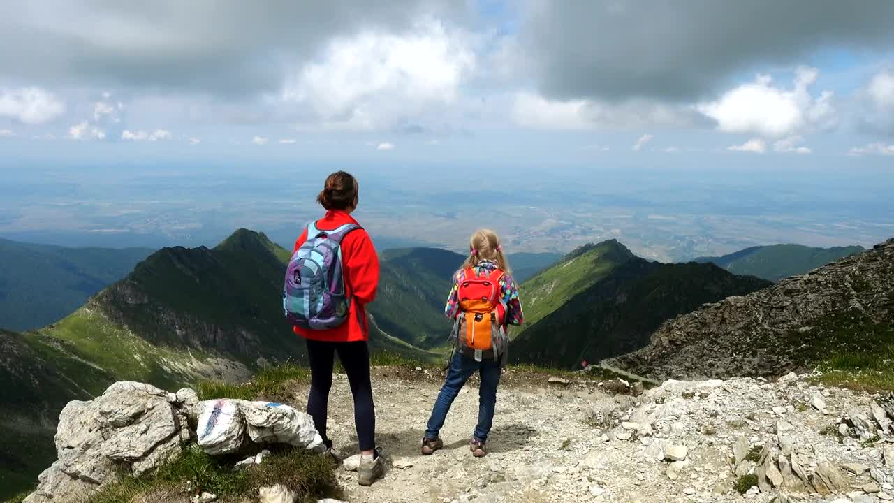   Stock Footage Two Girls Enjoying The View In The Mountain Live Wallpaper