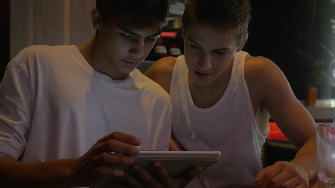   Stock Footage Two Friends Browsing Social Media Live Wallpaper