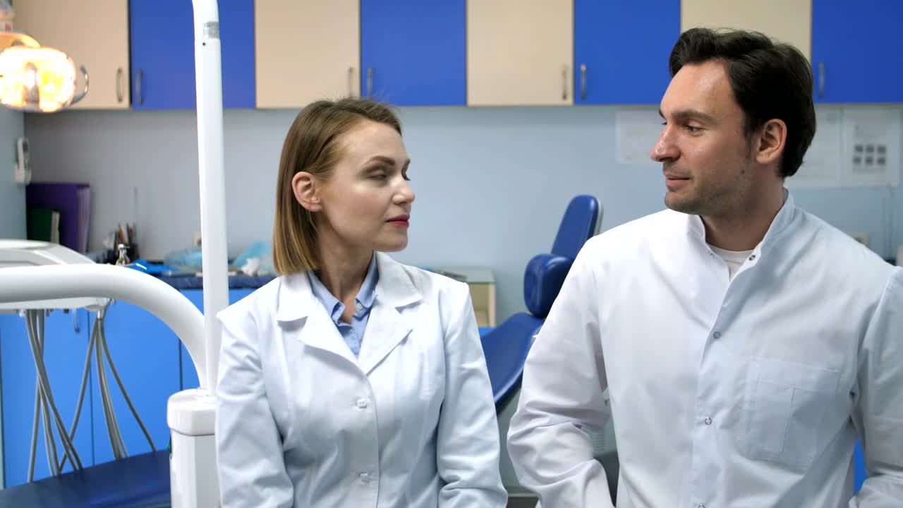   Stock Footage Two Dentists Discussing Work Live Wallpaper