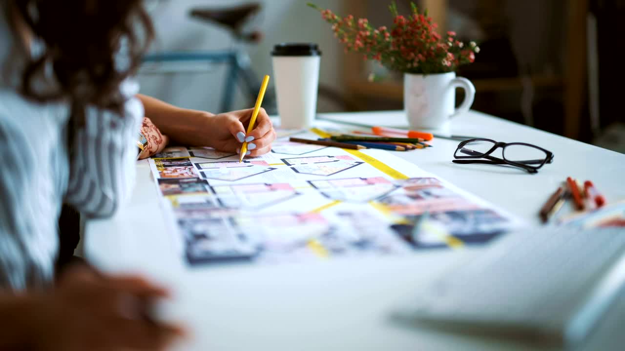   Stock Footage Two Creative Women Drawing Plan On Desk In Modern Studio Live Wallpaper
