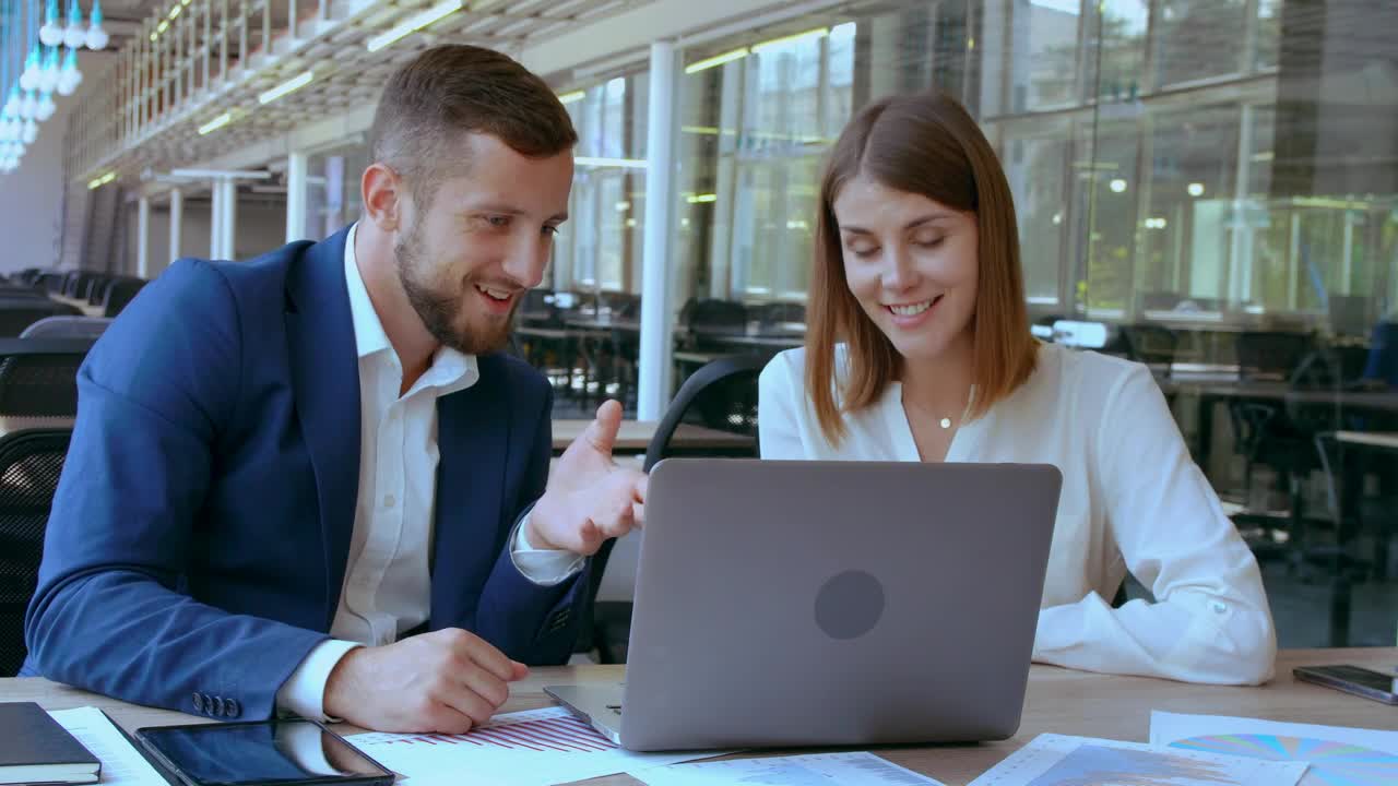   Stock Footage Two Coworkers Talking And Laughing Live Wallpaper
