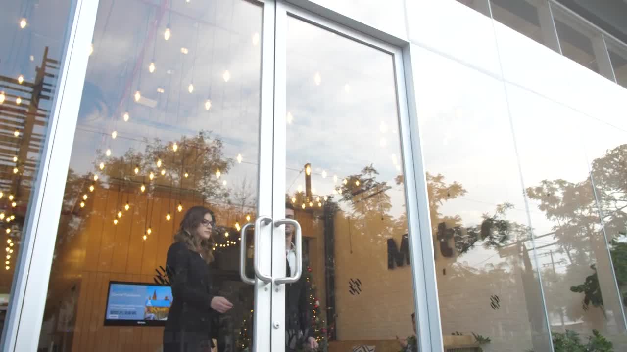   Stock Footage Two Business People Exit A Building Live Wallpaper