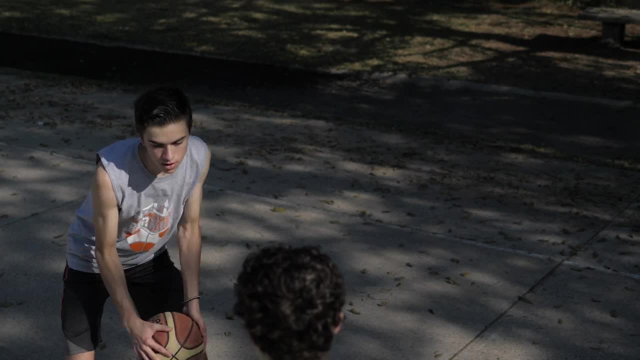   Stock Footage Two Boys Playing Basketball One On One Live Wallpaper