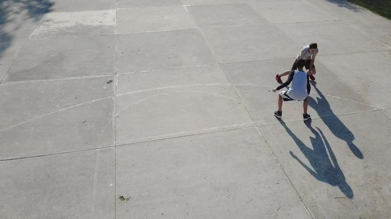  Stock Footage Two Boys Playing Basketball Outdoors Live Wallpaper
