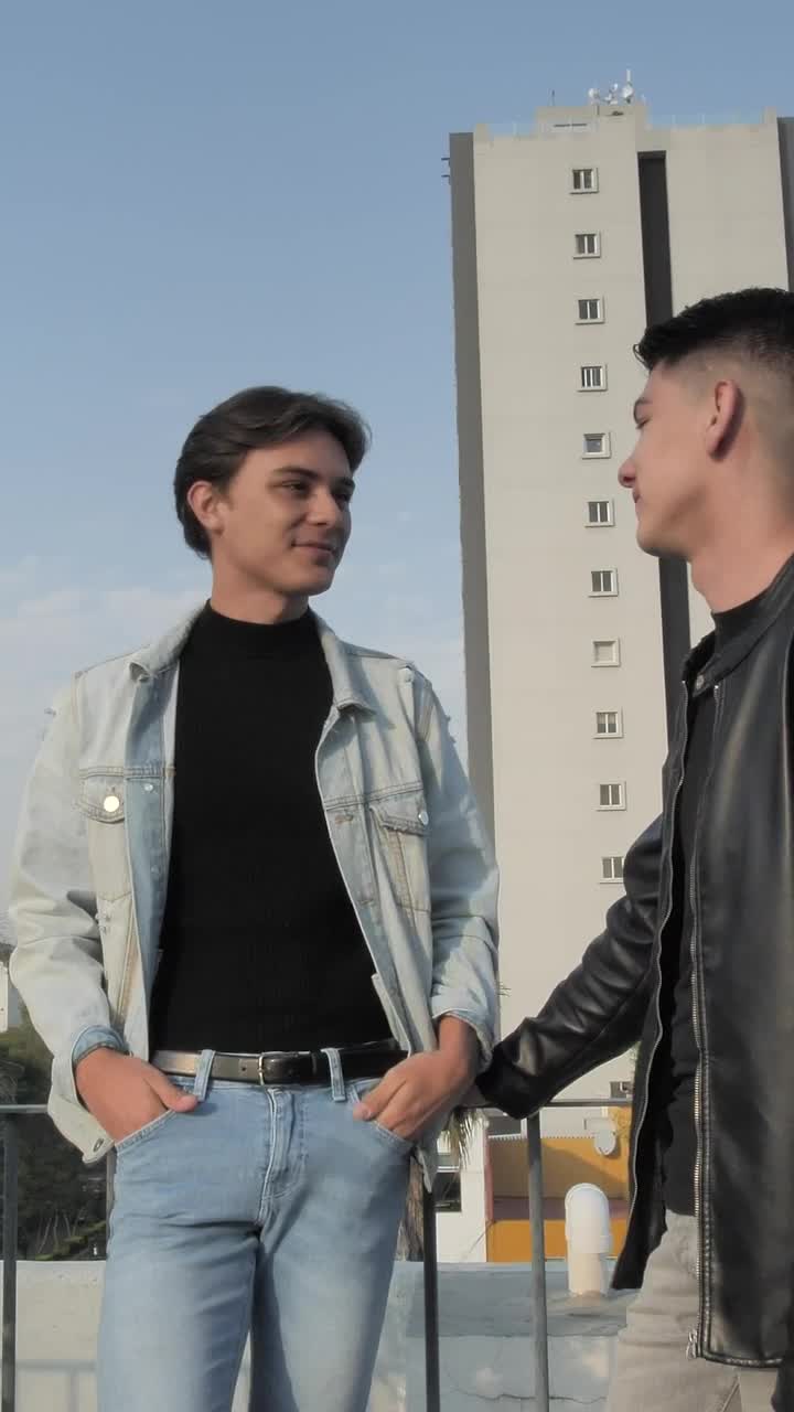   Stock Footage Two Boyfriends Chat On The Rooftop In A City Live Wallpaper