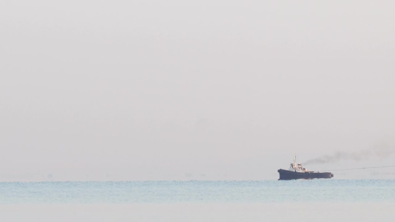   Stock Footage Tugboat Pulling A Barge Live Wallpaper