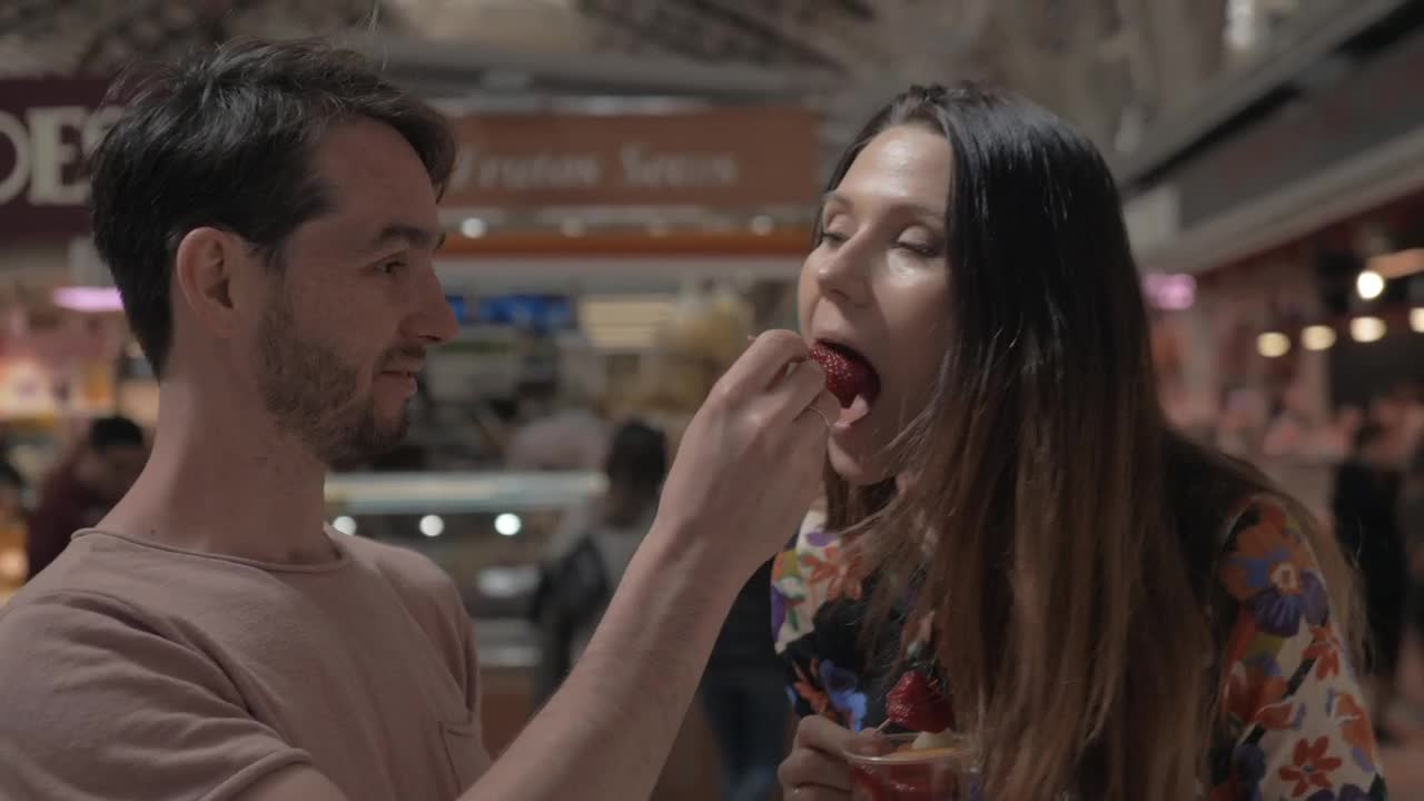   Stock Footage Trying Samples At A Cooking Expo Live Wallpaper