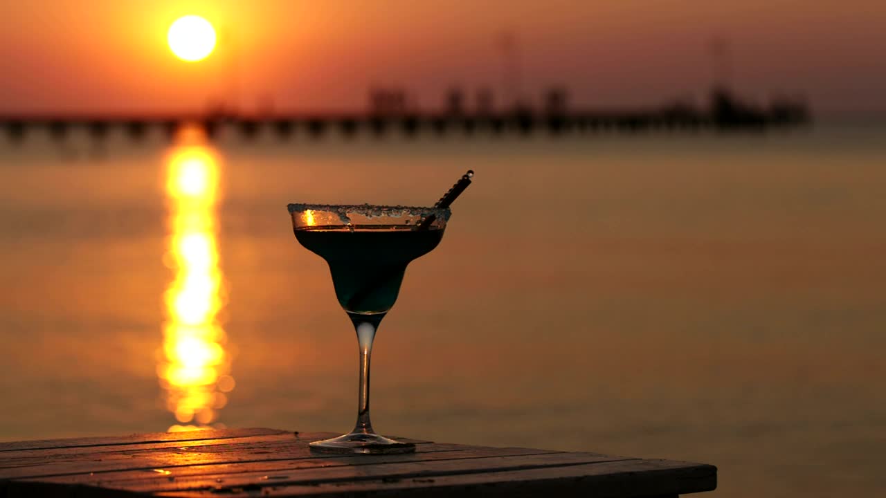   Stock Footage Tropical Cocktail Glass At Sunset Live Wallpaper