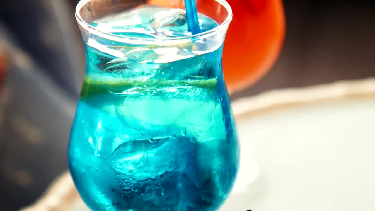   Stock Footage Tropical Blue Beverage With A Fruit Slice Live Wallpaper