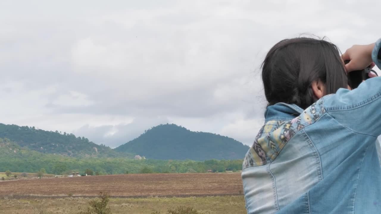   Stock Footage Traveling Woman Taking Outdoor Photos Live Wallpaper