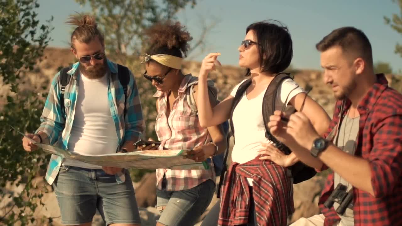   Stock Footage Travelers Looking At The Map In The Wilderness Live Wallpaper