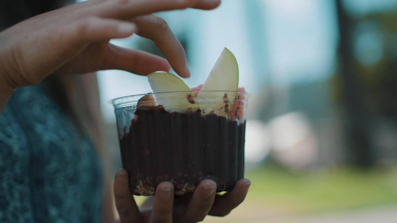Stock Footage Woman Using Her Hands To Eat From Healthy Breakfast Bowl Live Wallpaper Free