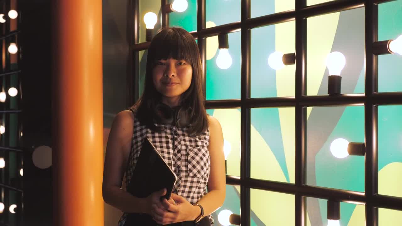 Stock Footage Woman Holding A Tablet Live Wallpaper Free