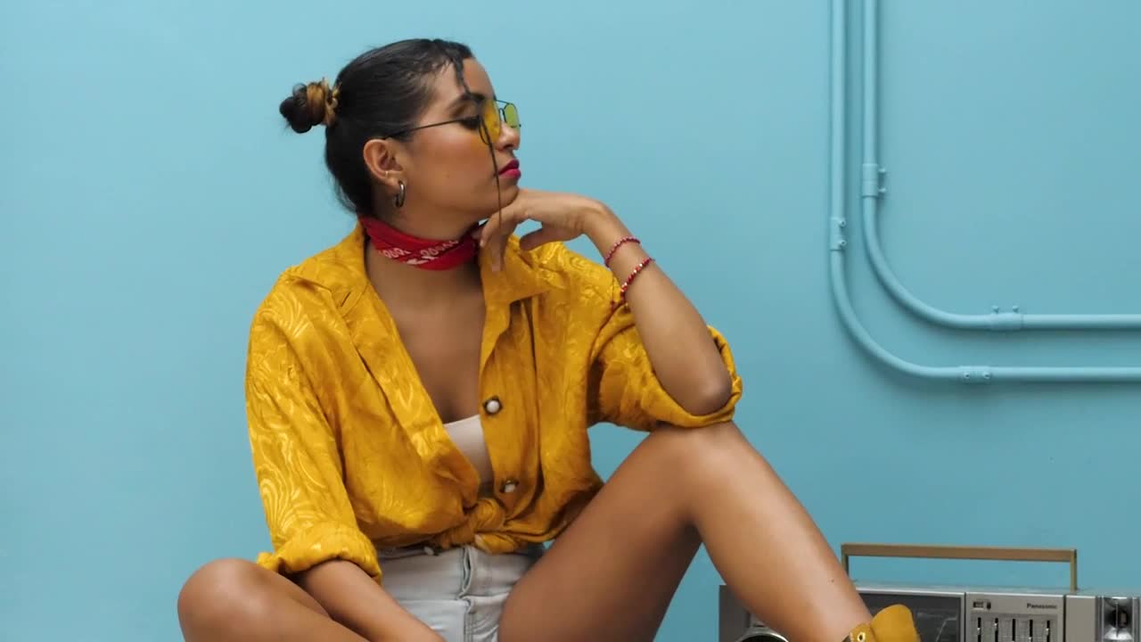 Stock Footage Woman Sitting Down Next To Retro Boombox Live Wallpaper Free