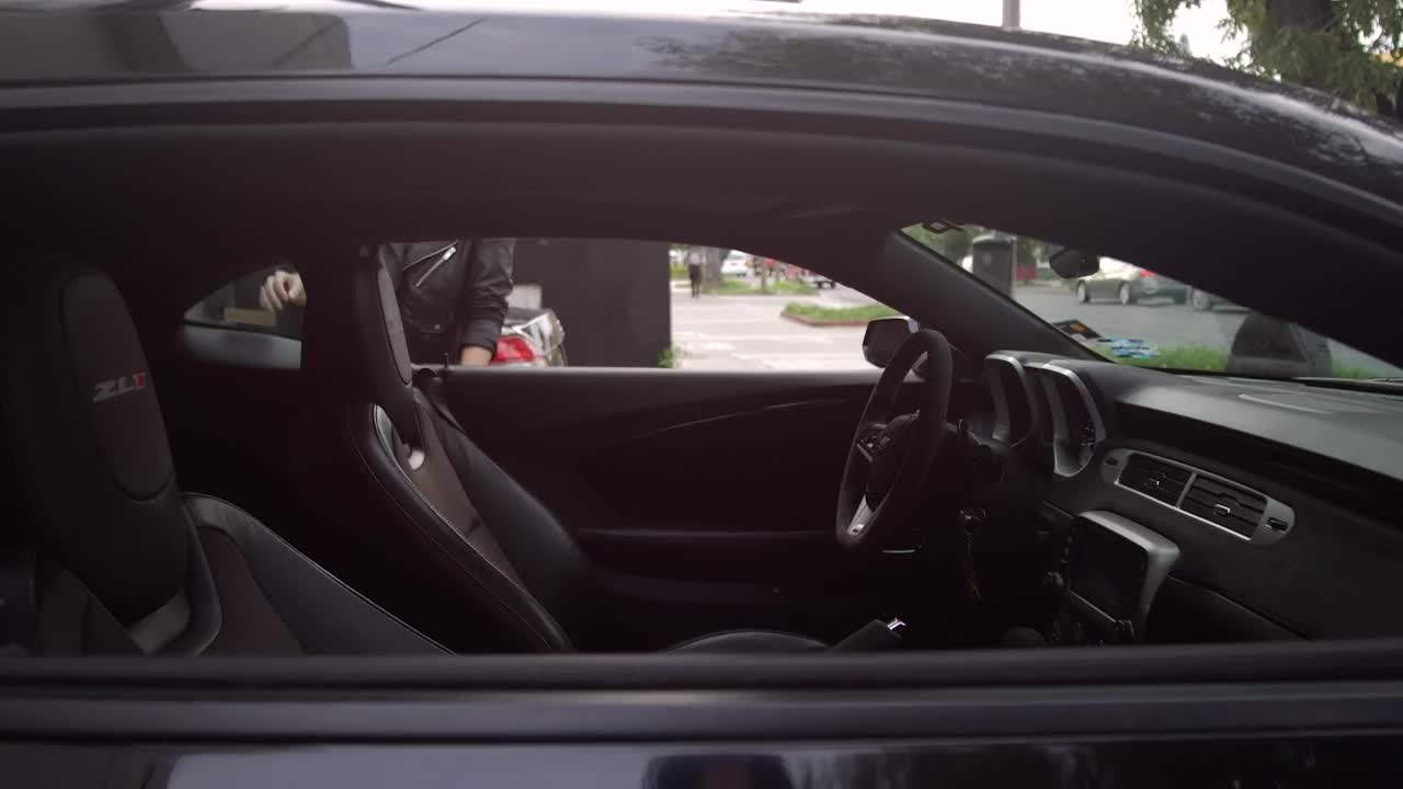 Stock Footage Woman Getting Into Drivers Seat Of Luxury Vehicle Live Wallpaper Free