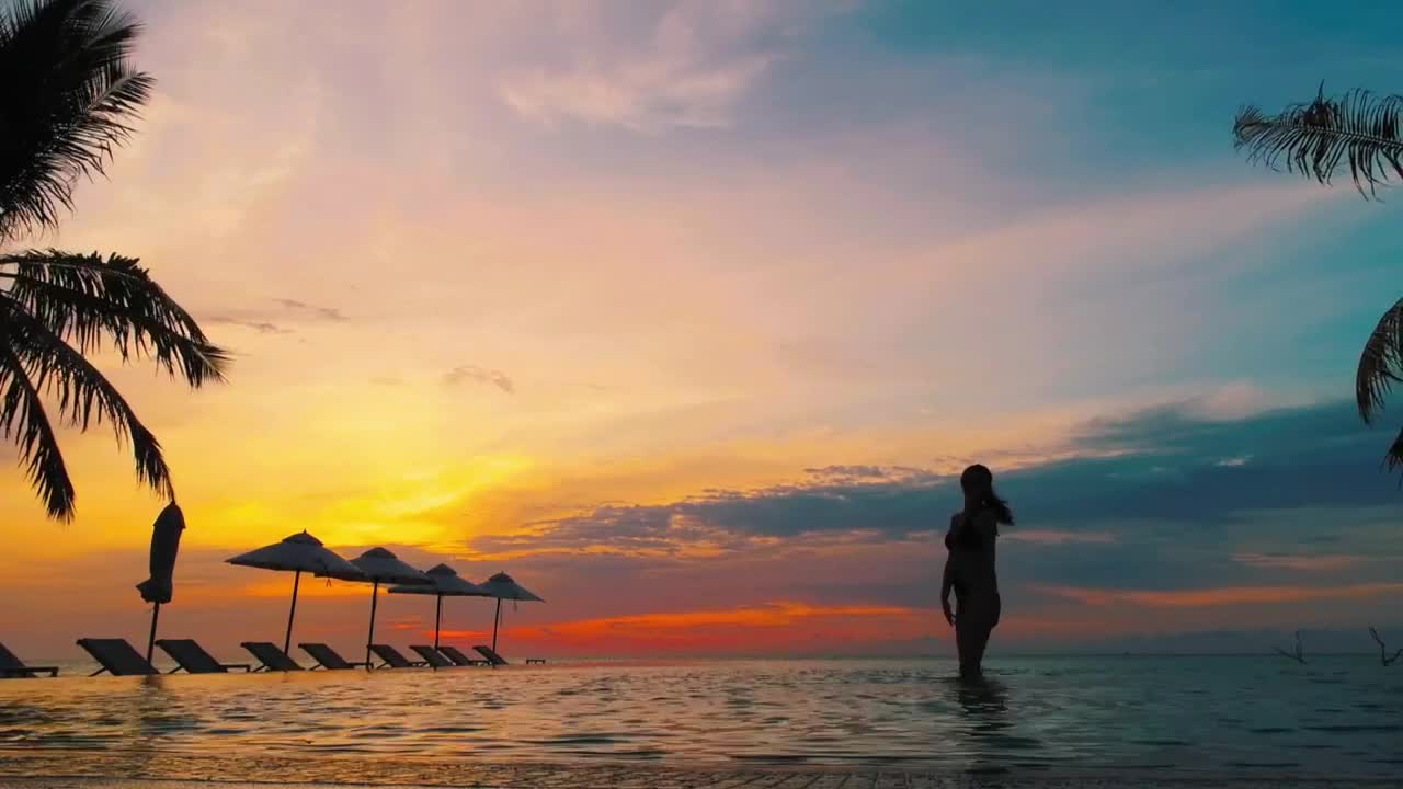 Stock Footage Woman In A Pool At Sunset Live Wallpaper Free