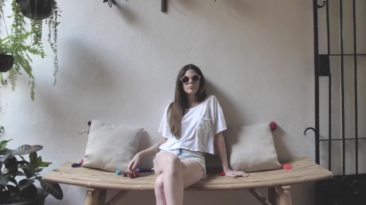 Stock Footage Woman On Bamboo Bench Live Wallpaper Free