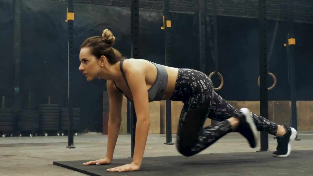 Stock Footage Woman Doing Mountain Climber Exercise Live Wallpaper Free