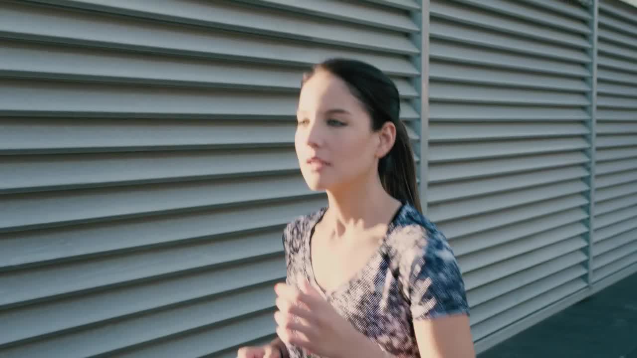 Stock Footage Woman Runner On The Sidewalk Live Wallpaper Free
