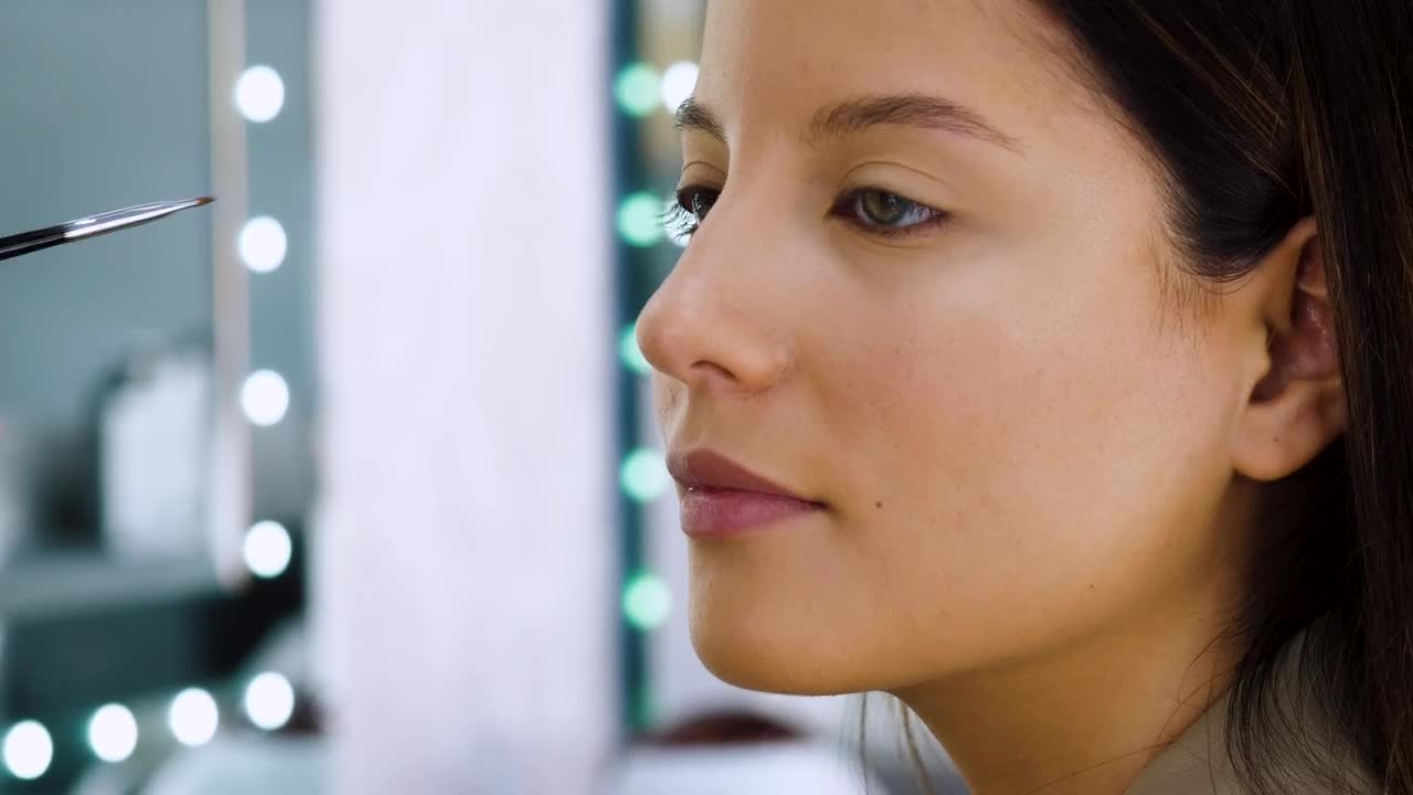 Stock Footage Woman Using Makeup Live Wallpaper Free
