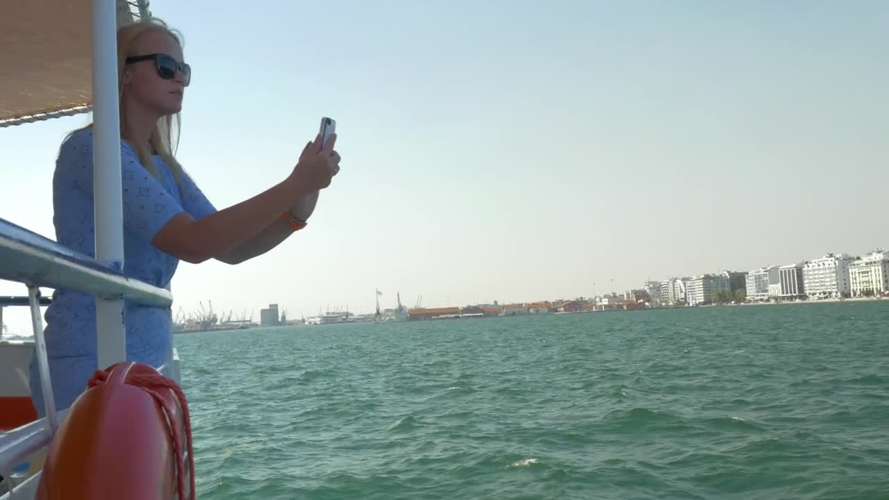 Stock Footage Woman Taking Photos From A Tour Boat Live Wallpaper Free