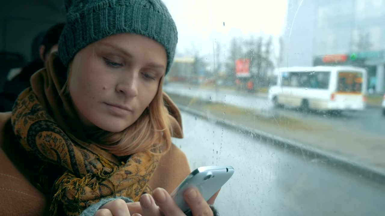 Stock Footage Woman Using Her Phone On A Rainy Day Live Wallpaper Free