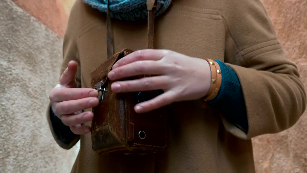 Stock Footage Woman Walking Around With A Retro Camera Live Wallpaper Free