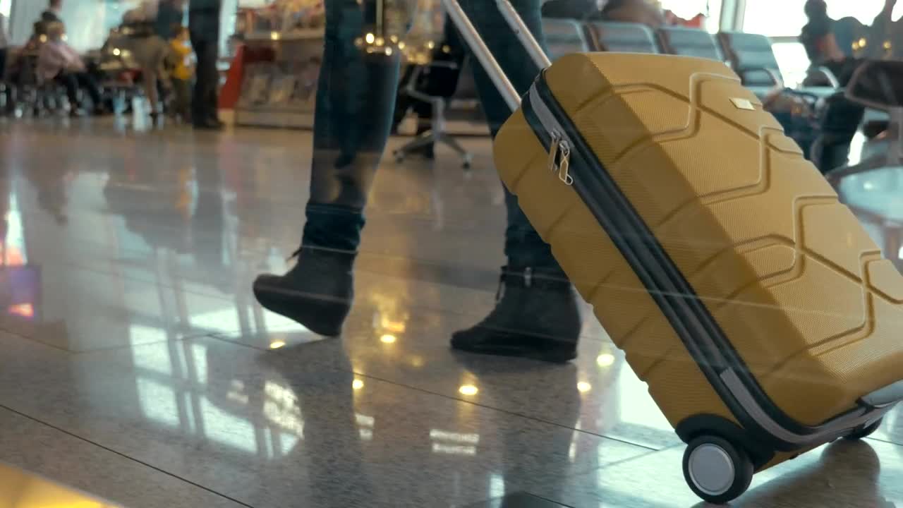 Stock Footage Woman Walking Slowly Towards A Terminal Live Wallpaper Free