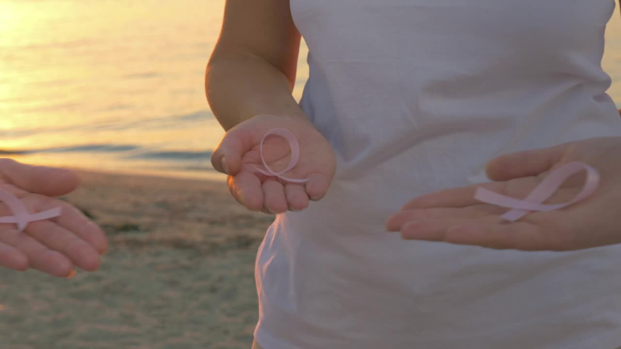 Stock Footage Women Holding Out The Breast Cancer Ribbon Live Wallpaper Free