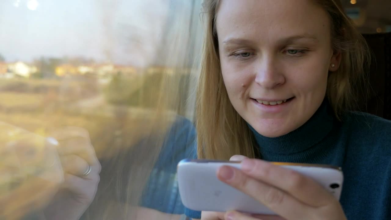 Stock Footage Woman Smiles As She Checks Her Messages Live Wallpaper Free