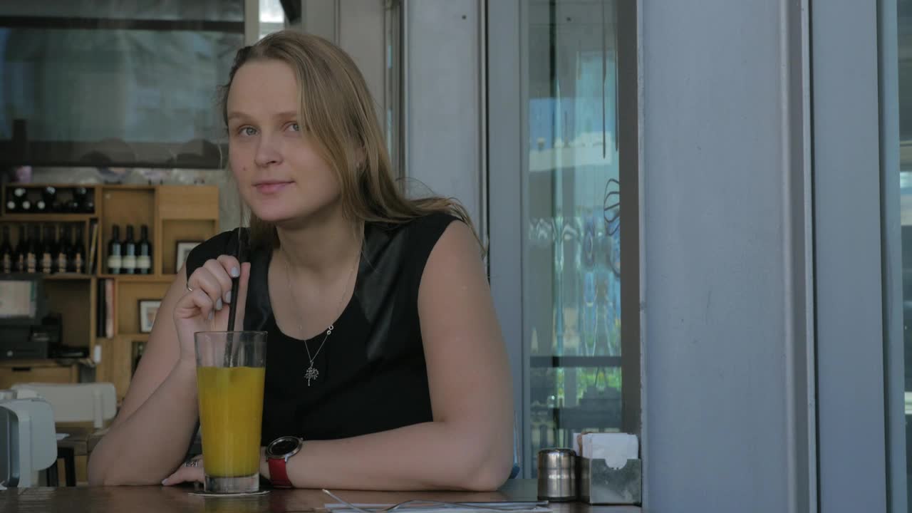 Stock Footage Woman With A Glass Of Orange Juice Live Wallpaper Free